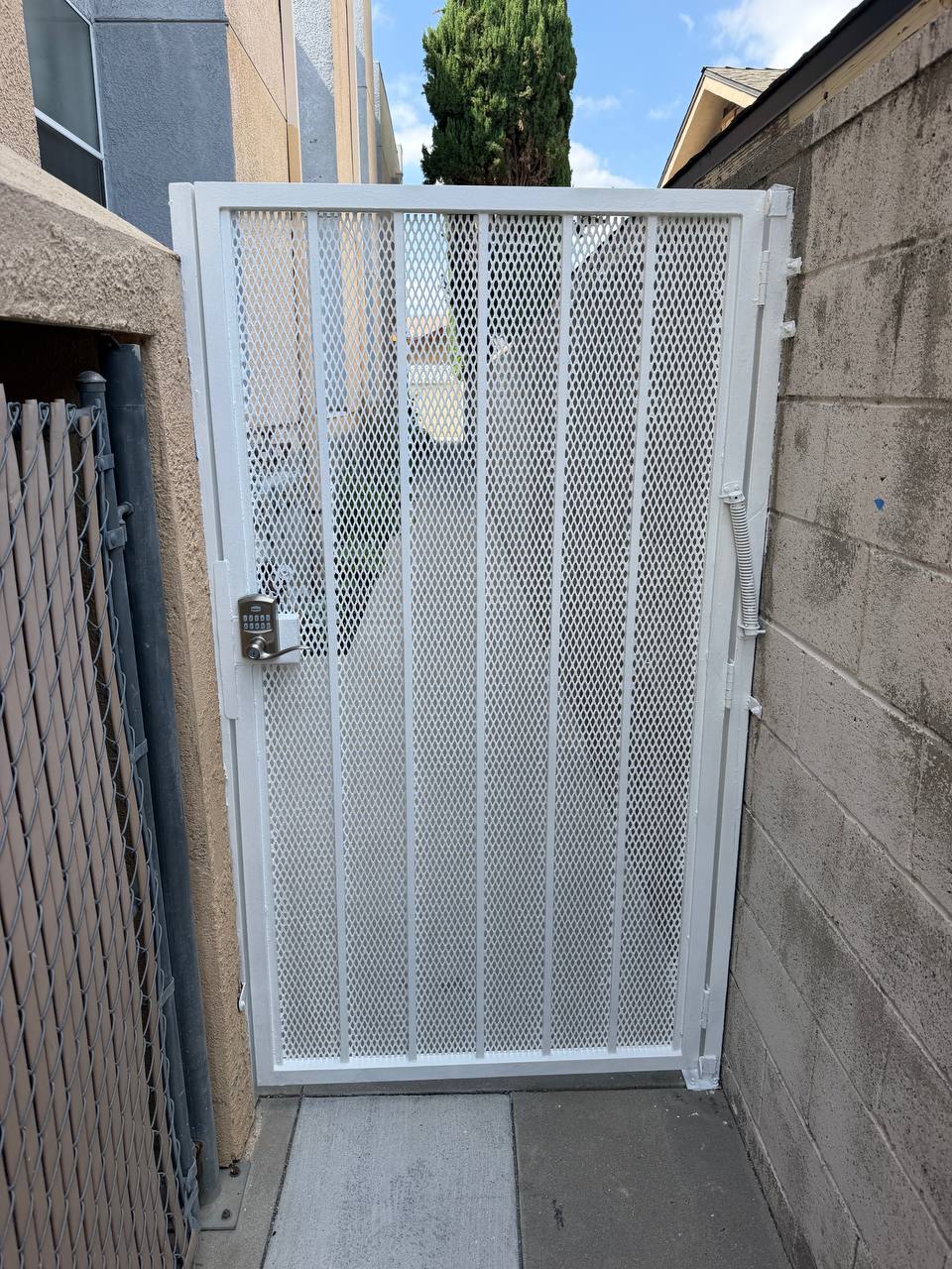 Finished white pedestrian gate in Van Nuys